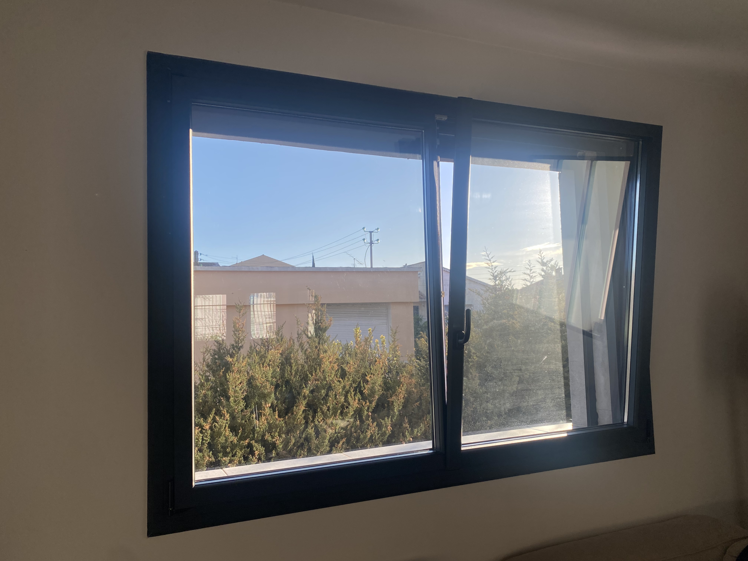 Pose fenêtre oscillo battante